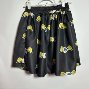 🦇👁️💛🖤 Amazing flying eyeball skater skirt